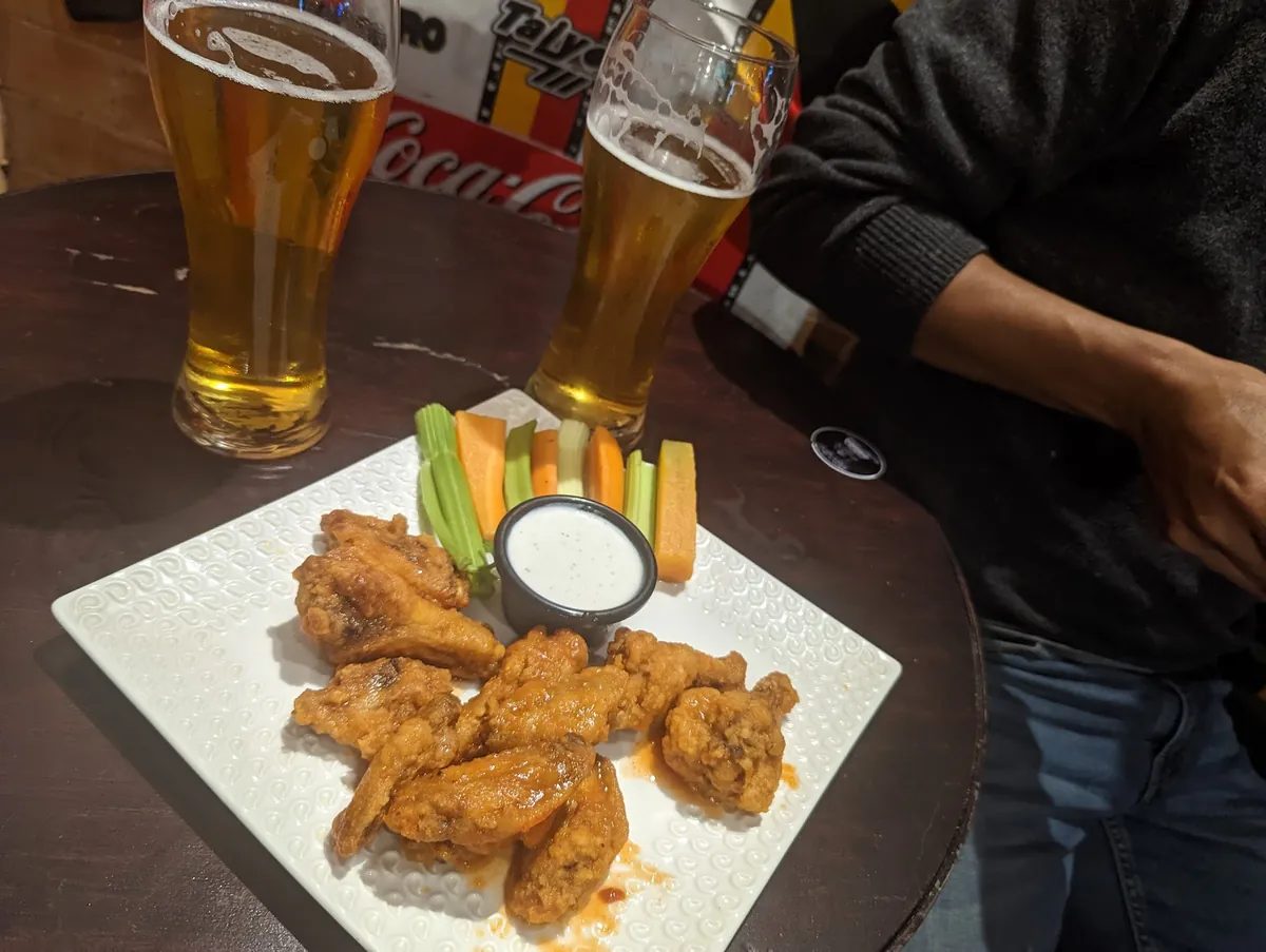 Plate of chicken wings at Bullseye restaurant in Antigua Guatemala