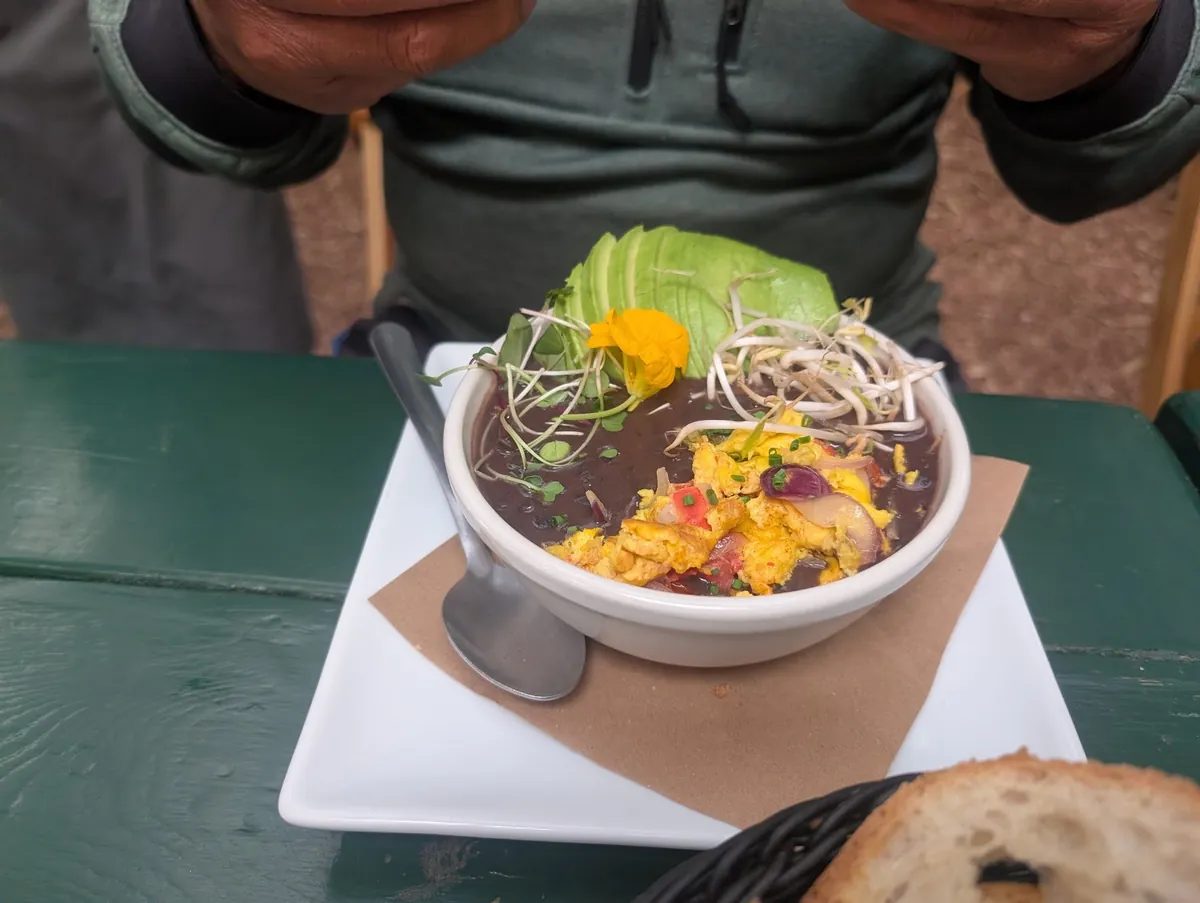 Black bean (frijol) breakfast plate at Caoba Farms near Antigua Guatemala